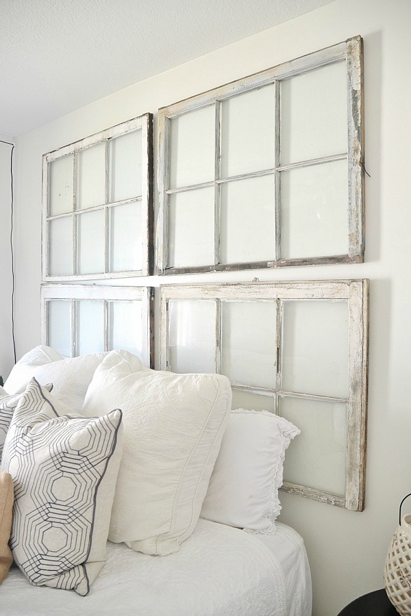 Guest Bedroom makeover on a budget! See how thrifted finds, a little paint, & some DIY made this guest bedroom lovely! 