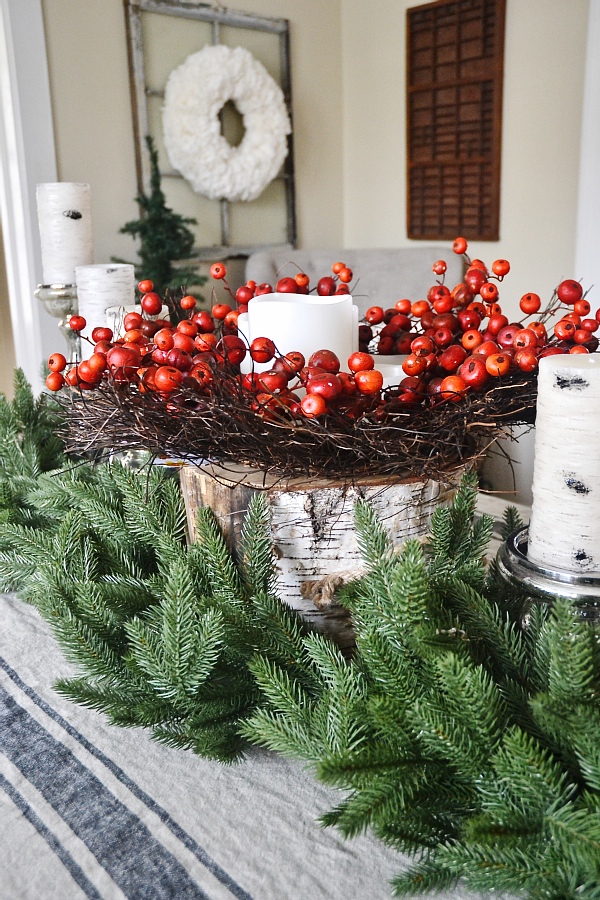 Cozy Rustic Christmas Dining Room - Christmas centerpiece, DIY wreaths, candles, texture, & more. A must pin for Christmas dining room inspiration!