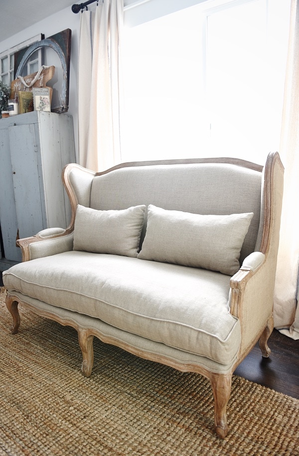 Farmhouse settee - burlap and natural fiber sofa perfect for a farmhouse living room. click to get the source.