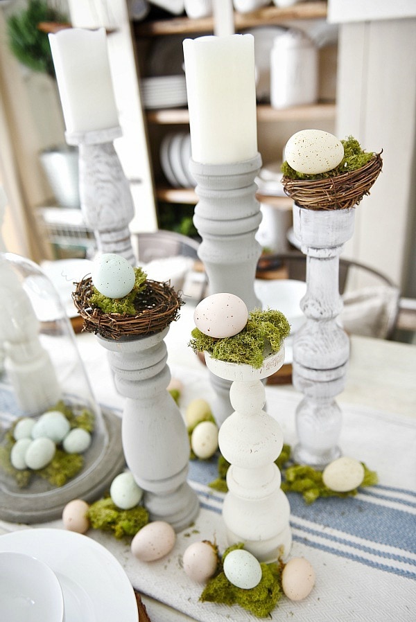 Simple Easter Dining room tablescape - rustic cottage easter decor with handmade candle holders, eggs, moss, & other touches. A must pin for Easter decor!