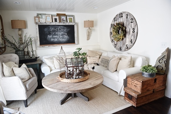 Cozy Neutral Farmhouse Style Living Room - With Ikea Ektorp Sectional. Cozy cottage style vibe makeover progress with source list of everything in the room - Great pin for neutral cozy home decor! 