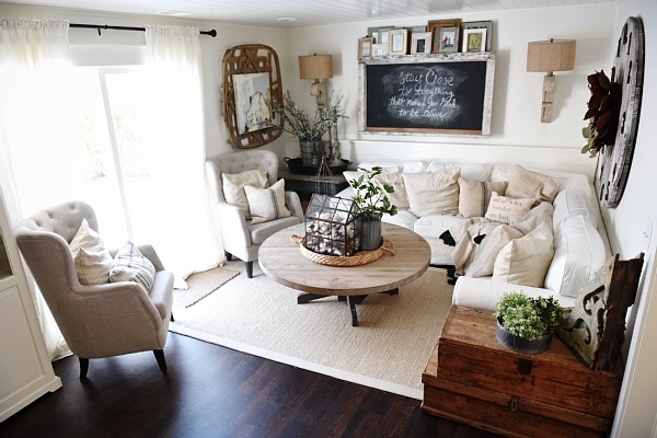 Cozy Neutral Farmhouse Style Living Room - With Ikea Ektorp Sectional. Cozy cottage style vibe makeover progress with source list of everything in the room - Great pin for neutral cozy home decor! 