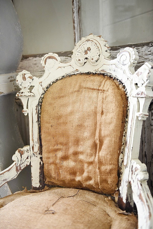 Cozy rustic cottage living room - Great pin for rustic farmhouse & cottage style decorating. A light and bright cozy living room with vintage touches like a settee, mora clock, card catalog, & so much more!