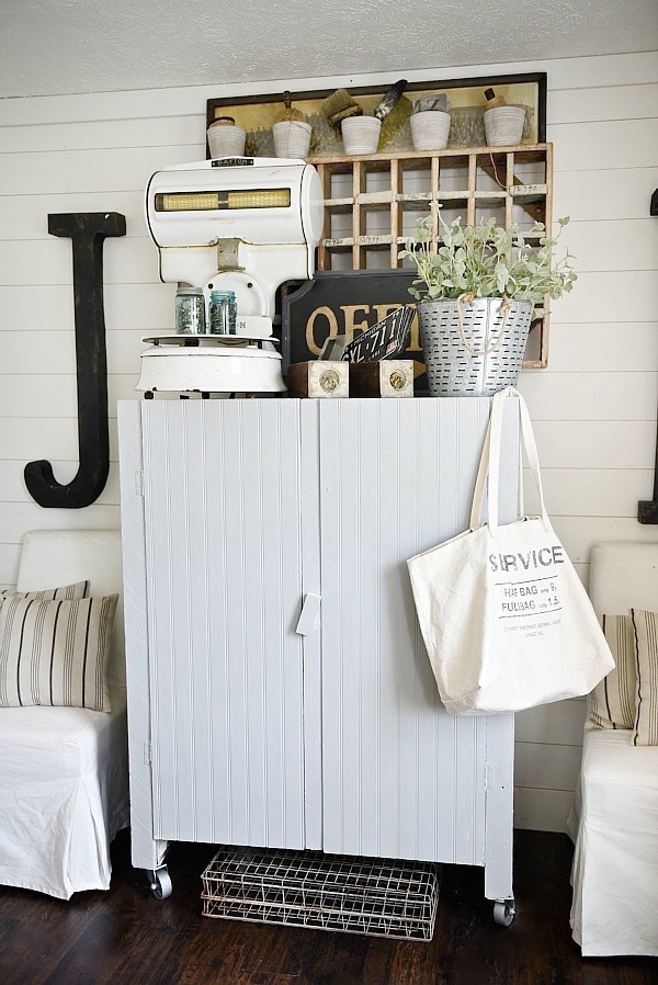 Office makeover - craft cabinet makeover. A great way to make any piece have a cottage feel. Add beadboard to the front of the cabinet & cover with chalkpaint for a farmhouse piece of furniture. Great craft closet idea! 