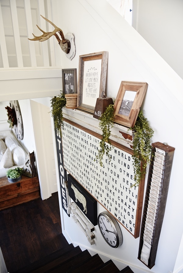 DIY stairway gallery wall - A great blog for DIY farmhouse decor & inspiration for a farmhouse style staircase gallery wall. A must pin for future gallery walls for any room of your home! 