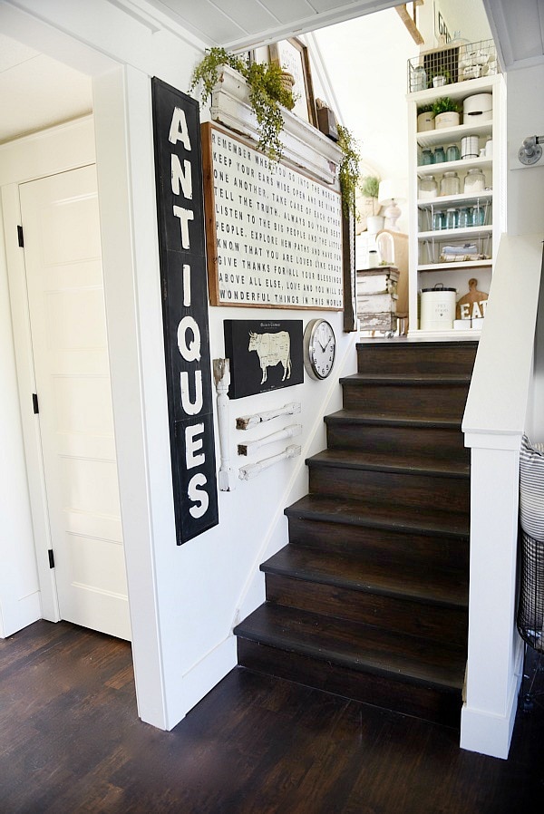DIY stairway gallery wall - A great blog for DIY farmhouse decor & inspiration for a farmhouse style staircase gallery wall. A must pin for future gallery walls for any room of your home! 