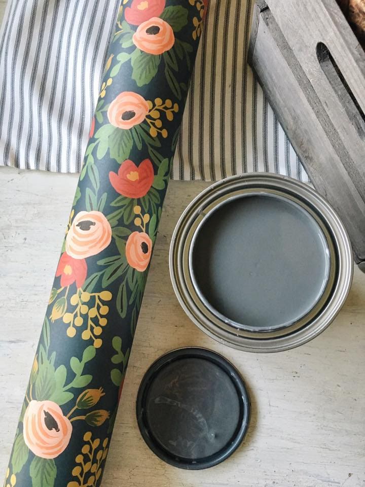 DIY Rustic window cabinet - so easy to build! This cabinet would be great in any room of the house for pretty storage. A great idea to add wrapping paper to the back of the cabinet for a pop of color. 