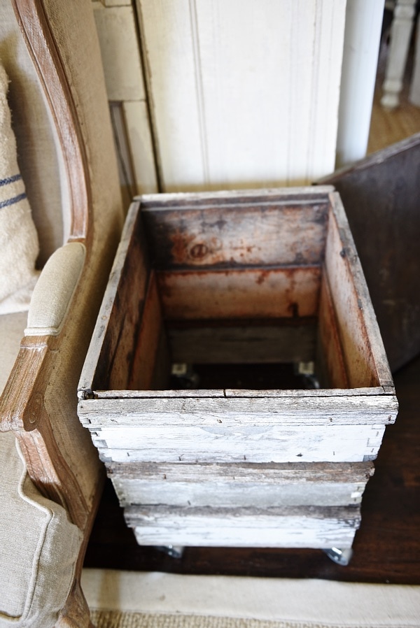 DIY rustic beehive end table - A must pin to make an easy rustic end table out of some antique finds. Great for farmhouse style living rooms!