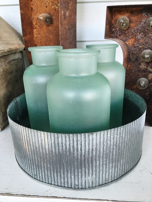 DIY cottage style sea foam sea glass bottles - The EASIEST way to get the sea glass look!! Great for farmhouse style or cottage style decor in any room! 