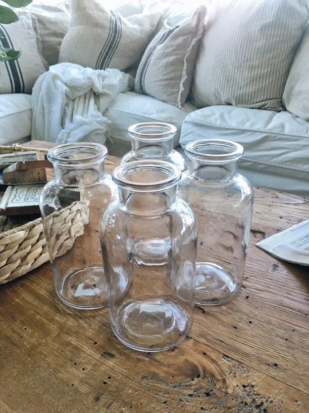 DIY cottage style sea foam sea glass bottles - The EASIEST way to get the sea glass look!! Great for farmhouse style or cottage style decor in any room! 