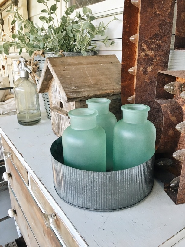 DIY cottage style sea foam sea glass bottles - The EASIEST way to get the sea glass look!! Great for farmhouse style or cottage style decor in any room! 