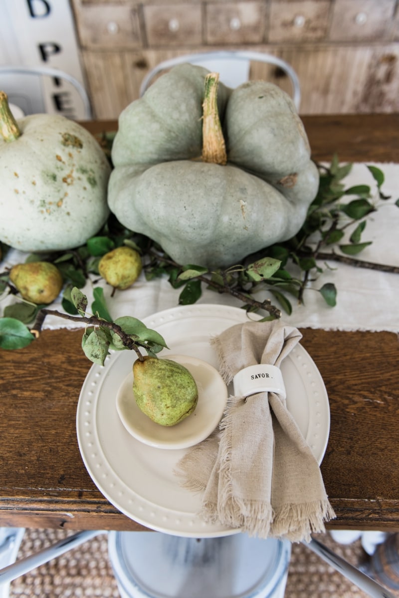 Rustic heirloom pumpkin and pear farmhouse table centerpiece