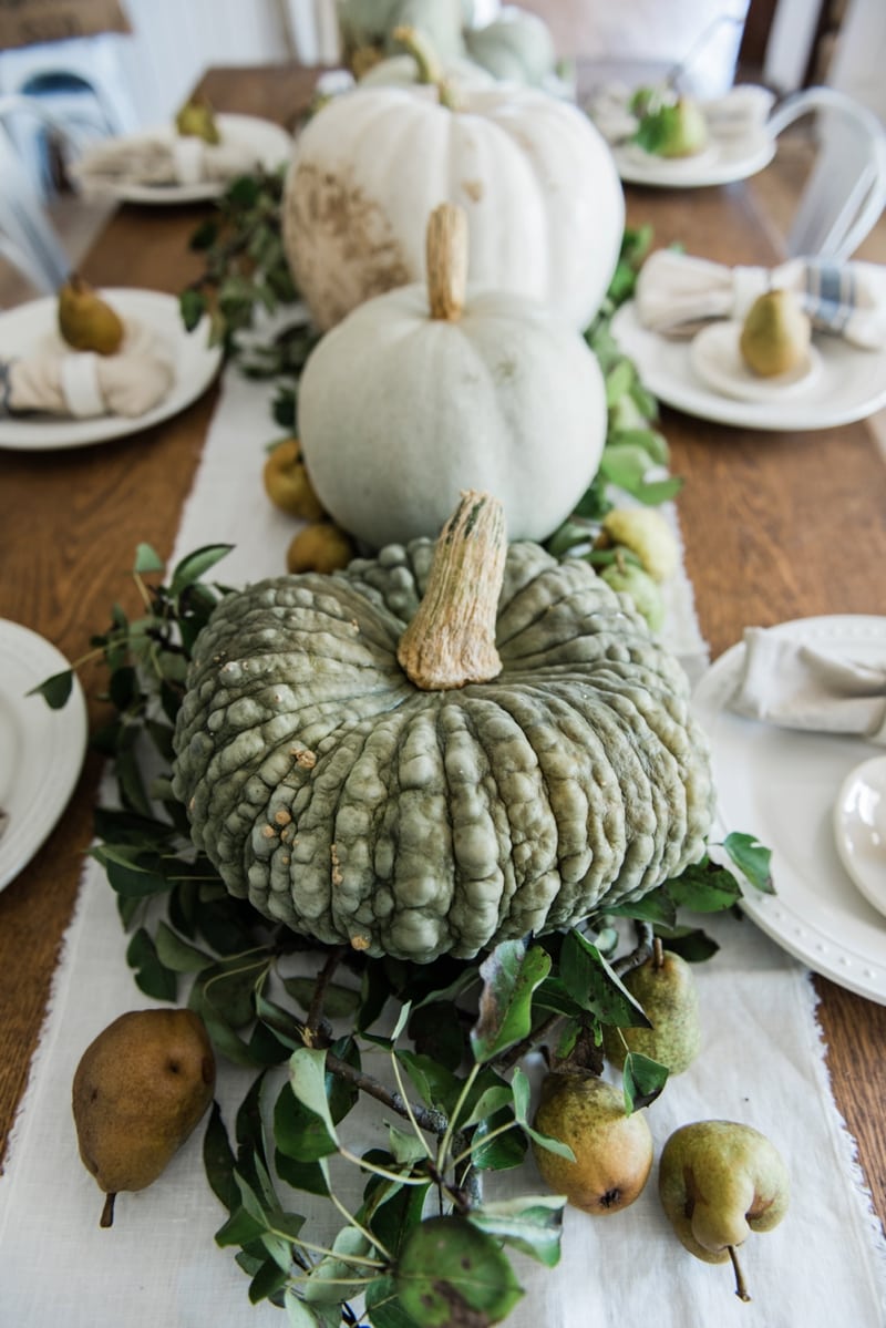 Rustic heirloom pumpkin and pear farmhouse table centerpiece