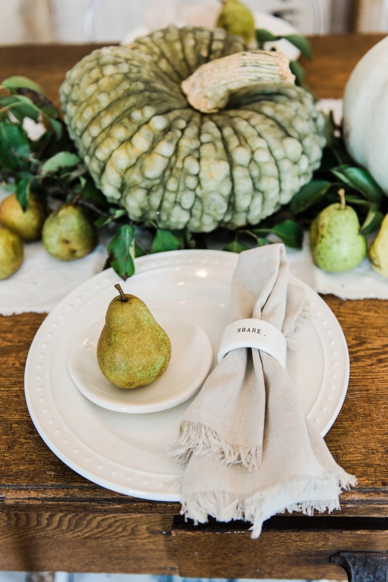 Rustic heirloom pumpkin and pear farmhouse table centerpiece