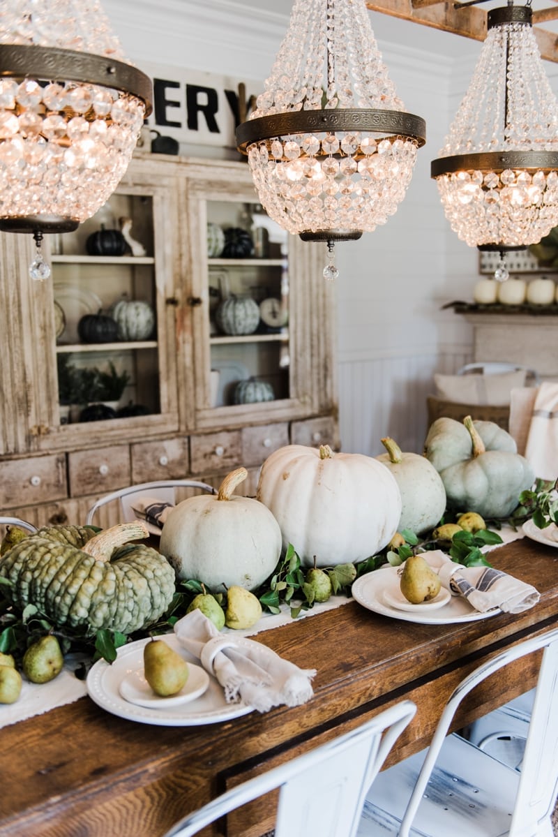 Rustic heirloom pumpkin and pear farmhouse table centerpiece