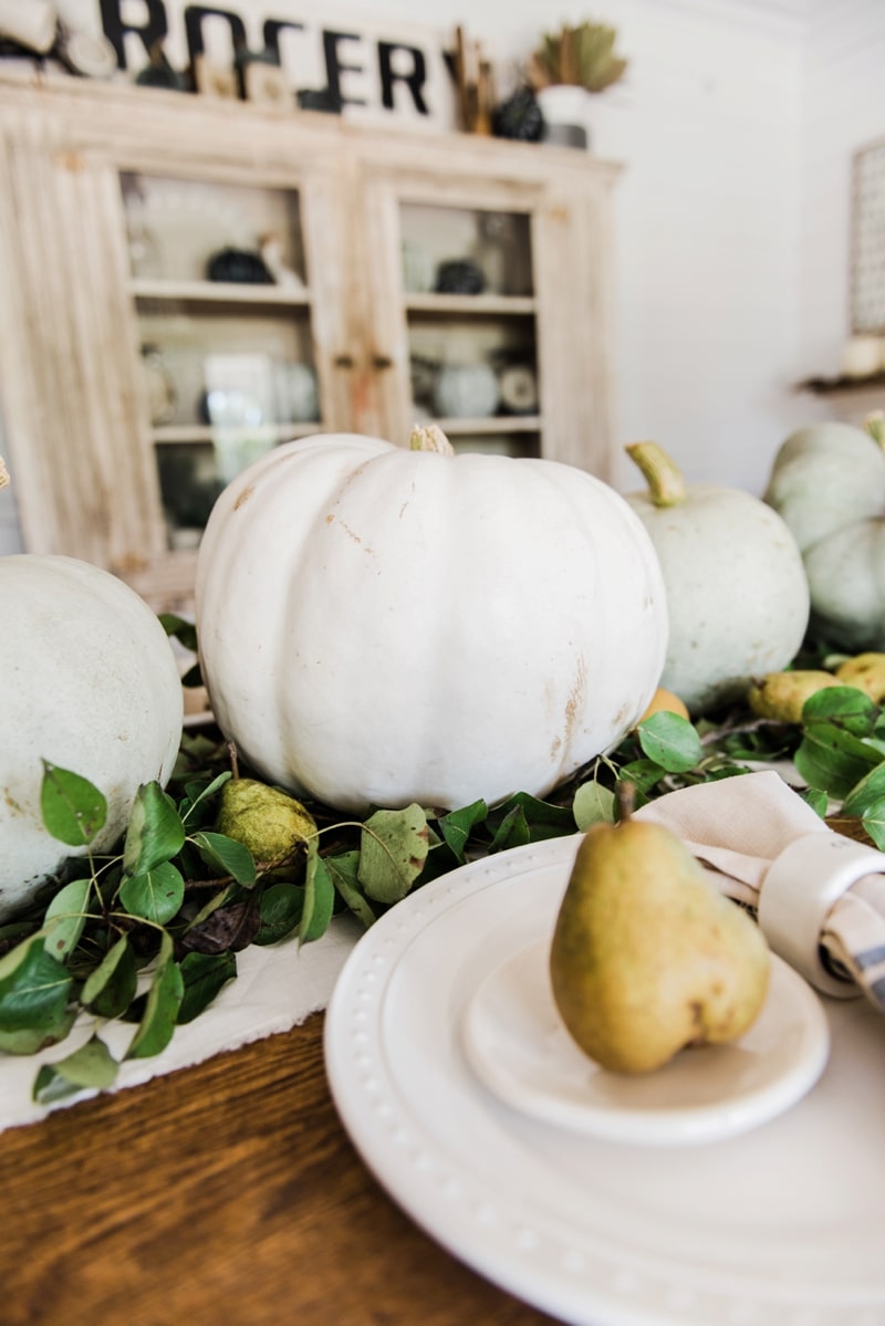 Rustic heirloom pumpkin and pear farmhouse table centerpiece