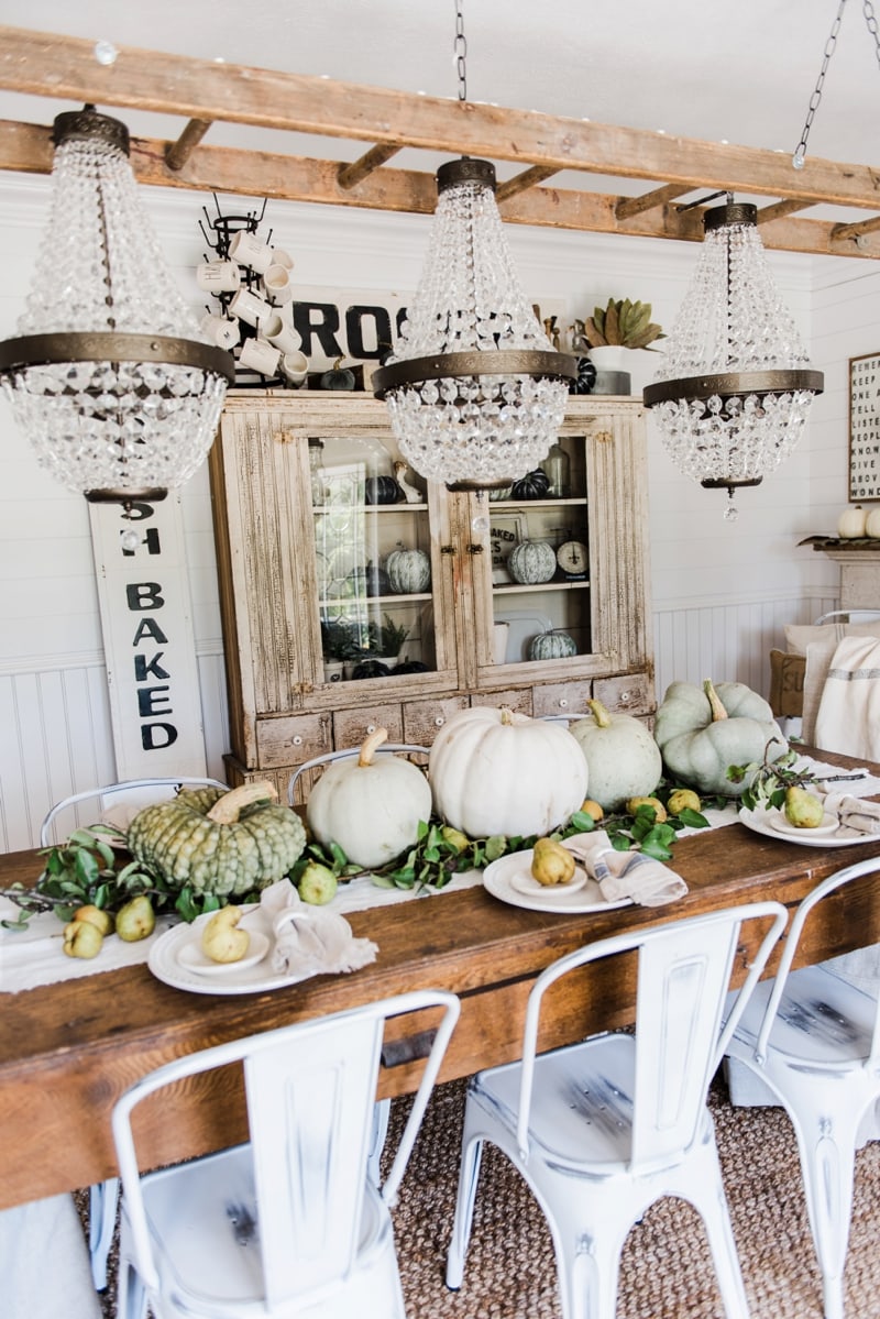 Rustic heirloom pumpkin and pear farmhouse table centerpiece