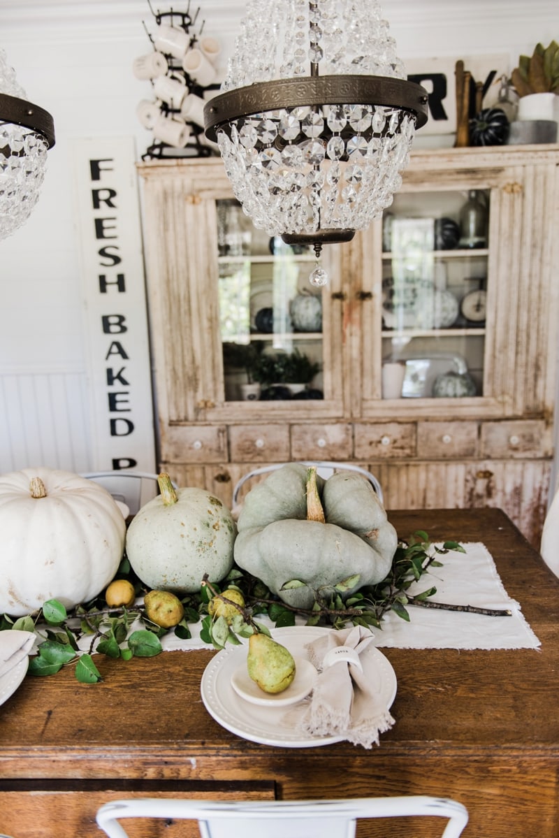 Rustic heirloom pumpkin and pear farmhouse table centerpiece