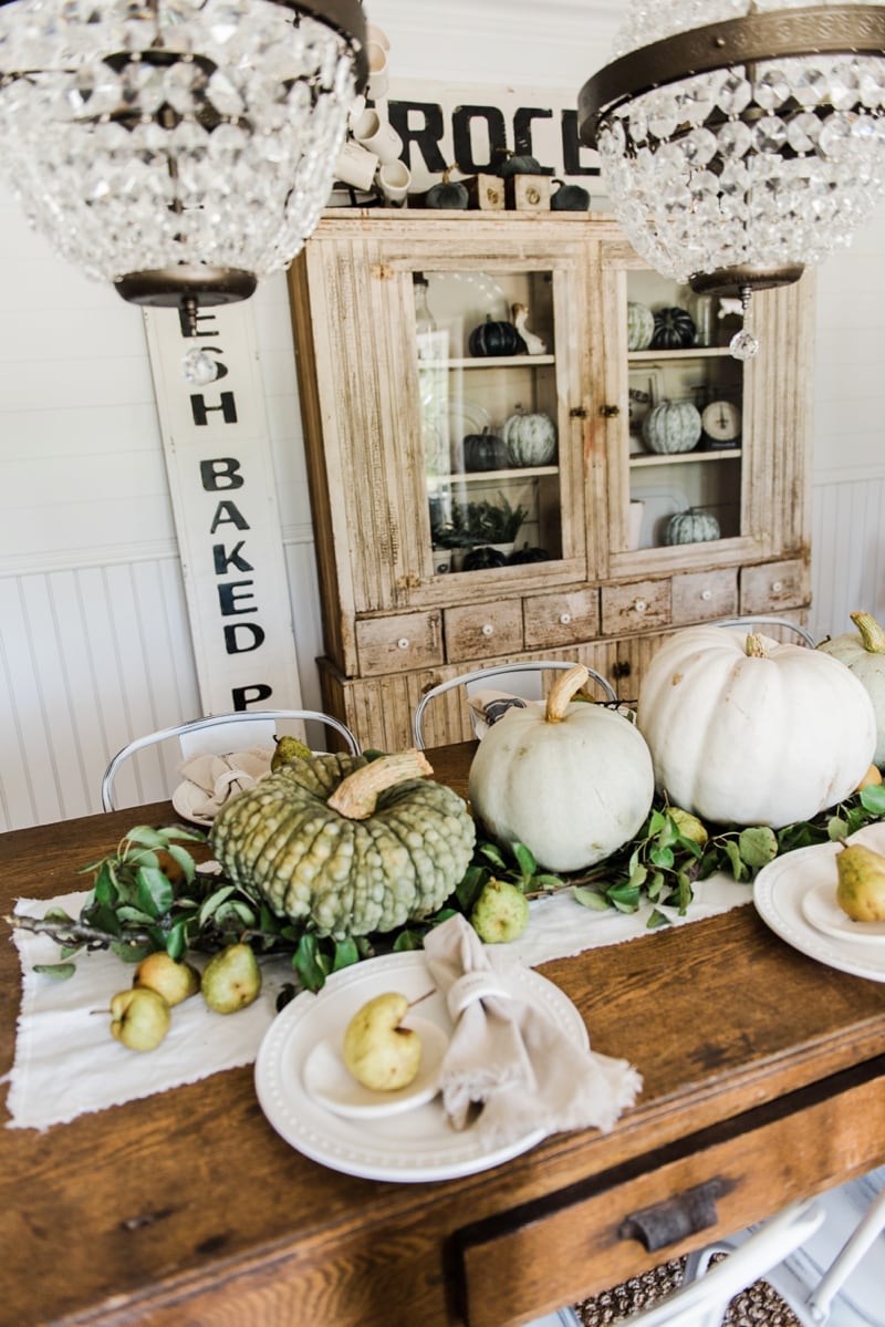 Rustic heirloom pumpkin and pear farmhouse table centerpiece