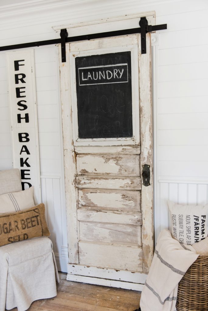 DIY laundry room sliding barn door - Great for any room of your home. A great way to add architectural farmhouse detail to any home. 