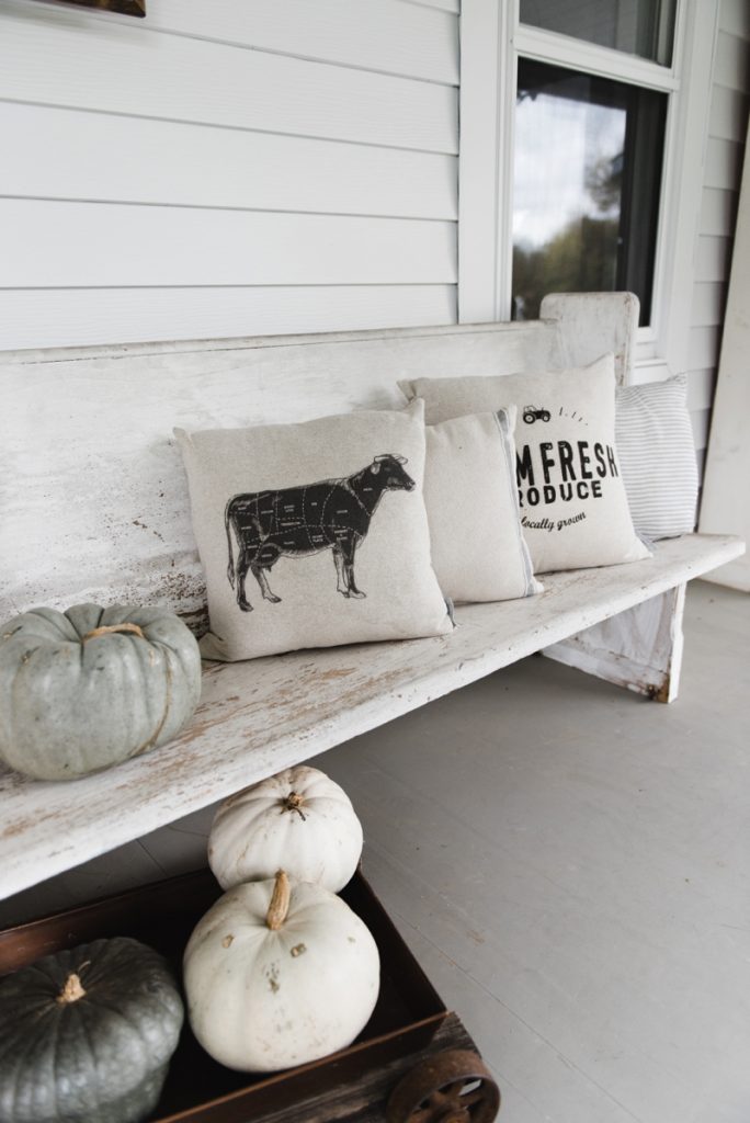 Farmhouse style porch - Church pew and farmhouse pillows on a porch... the perfect combo. 