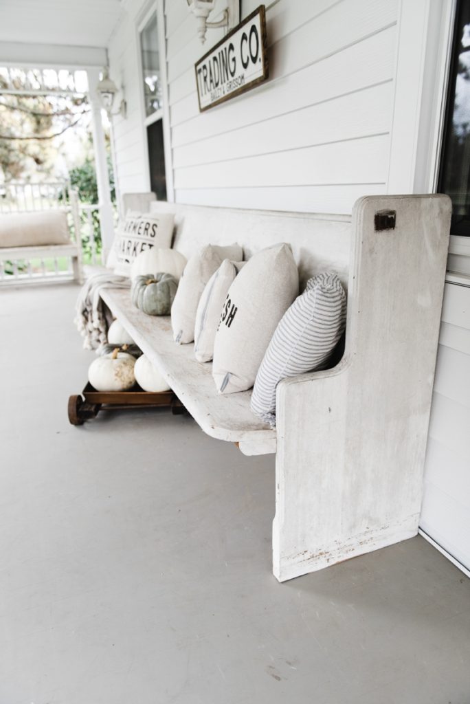 Farmhouse style porch - Church pew and farmhouse pillows on a porch... the perfect combo. 