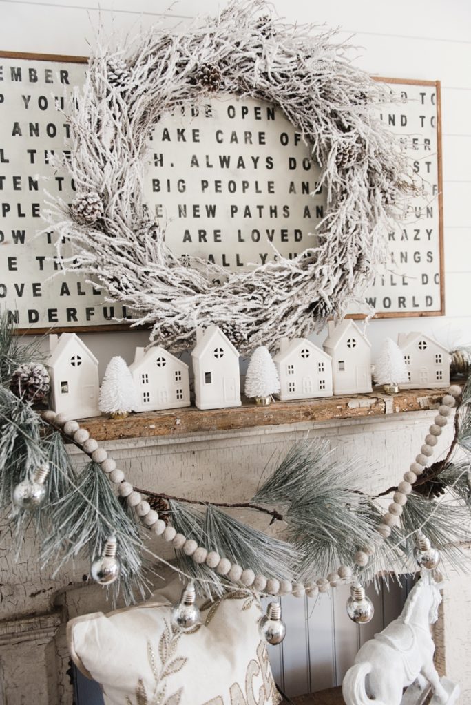 Farmhouse Christmas Village Mantel - Target dollar spot christmas village houses. A great rustic farmhouse mantel & christmas decor inspiration. 