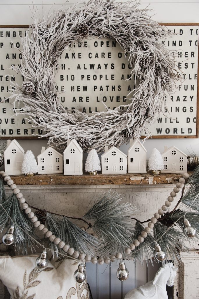 Farmhouse Christmas Village Mantel - Target dollar spot christmas village houses. A great rustic farmhouse mantel & christmas decor inspiration. 