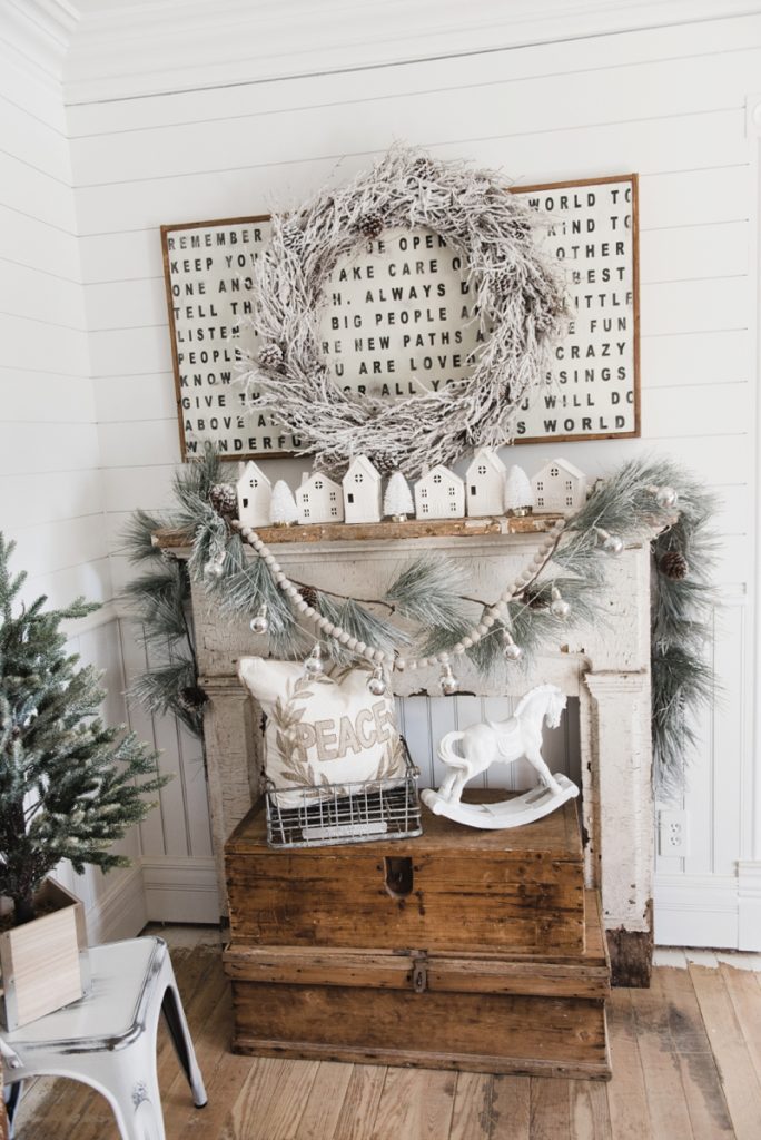 Farmhouse Christmas Village Mantel - Target dollar spot christmas village houses. A great rustic farmhouse mantel & christmas decor inspiration. 