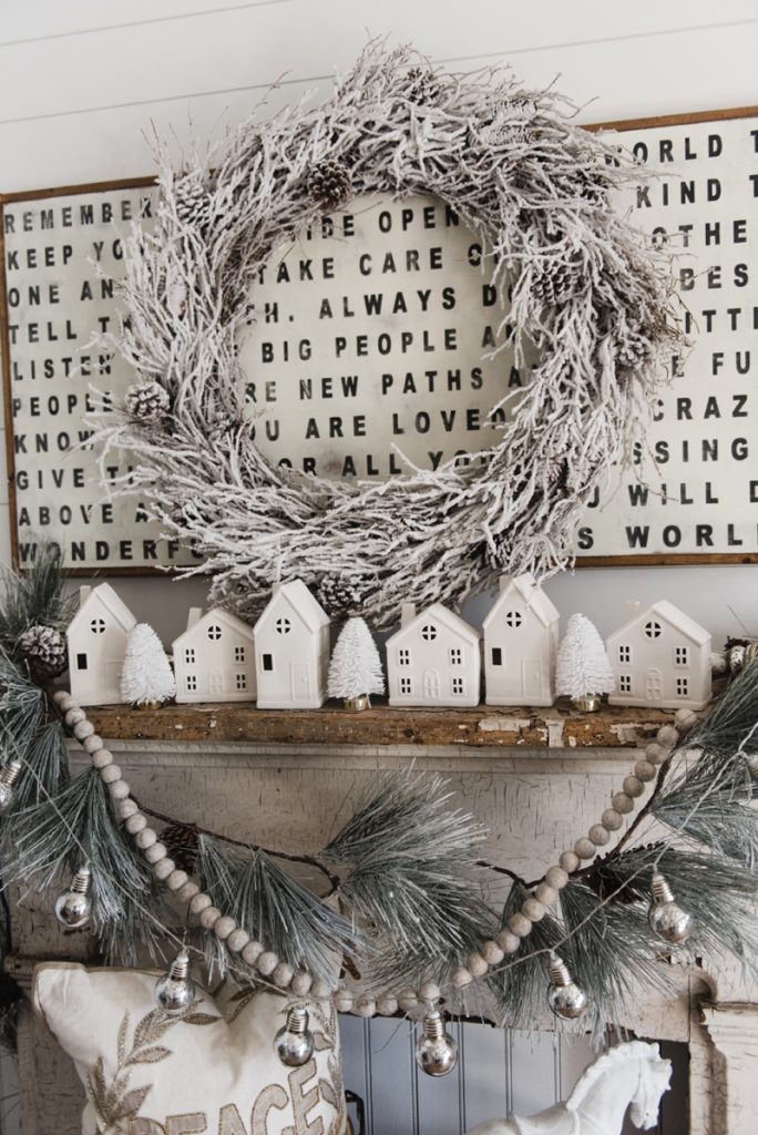 Farmhouse Christmas Village Mantel - Target dollar spot christmas village houses. A great rustic farmhouse mantel & christmas decor inspiration. 