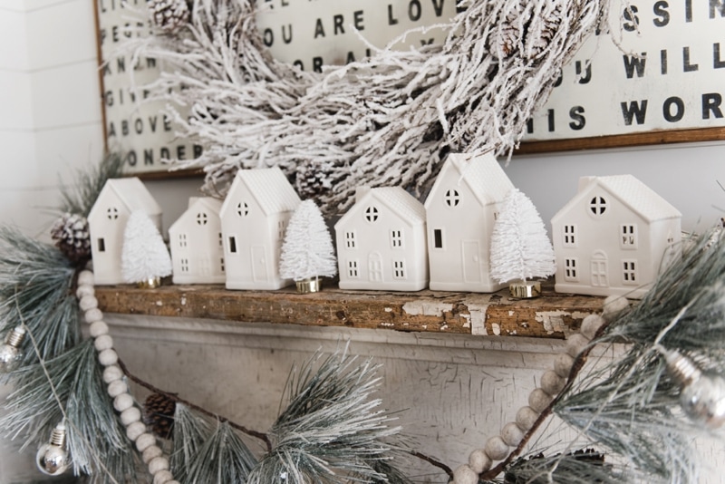 Farmhouse Christmas Village Mantel - Target dollar spot christmas village houses. A great rustic farmhouse mantel & christmas decor inspiration. 