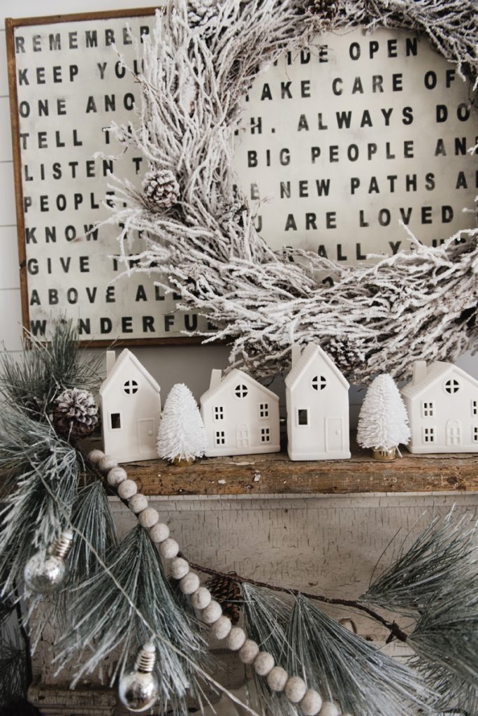 Farmhouse Christmas Village Mantel - Target dollar spot christmas village houses. A great rustic farmhouse mantel & christmas decor inspiration. 