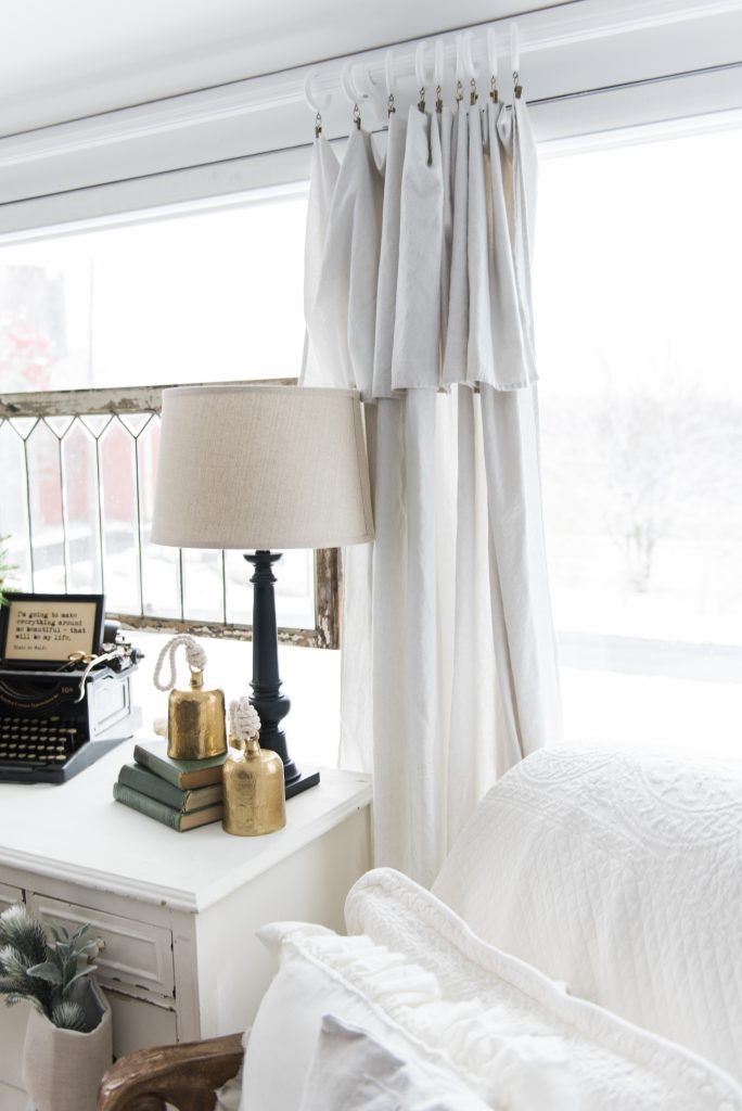 DIY drop cloth curtains - A simple & easy way to add farmhouse and cottage style curtains to any room on a budget! A great pin for farmhouse and cottage style decor inspiration! 