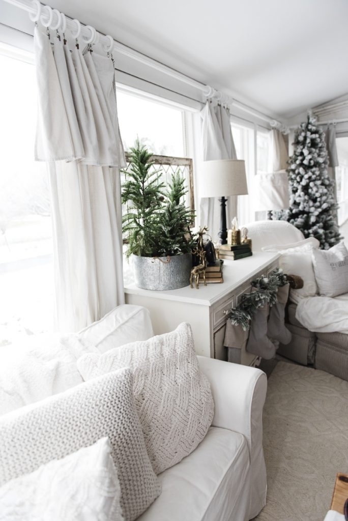 DIY drop cloth curtains - A simple & easy way to add farmhouse and cottage style curtains to any room on a budget! A great pin for farmhouse and cottage style decor inspiration! 