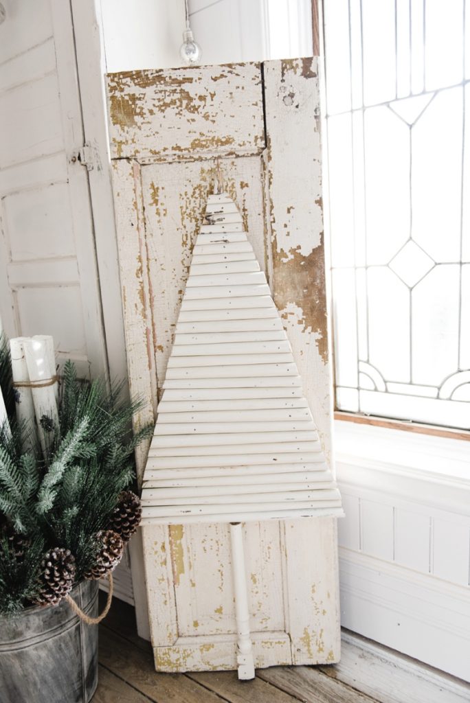 DIY chippy spindle Christmas tree - A super easy DIY farmhouse Christmas decor project. A must pin for farmhouse & cottage style Christmas inspiration! 