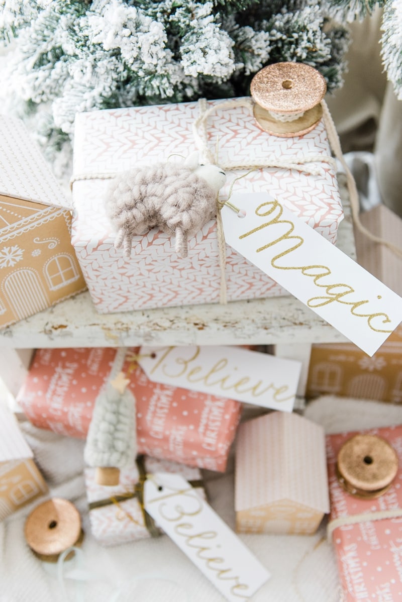 Farmhouse Gingerbread House Gift Wrap - Check out this rose gold gingerbread house gift wrap - a great pin for farmhouse & cottage style Christmas decor inspiration. 