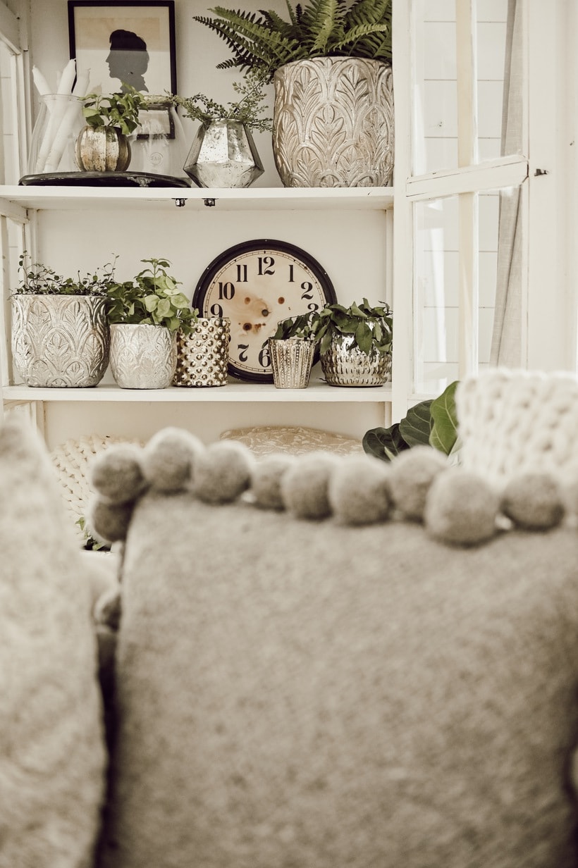 Using items around your house to style a shelf like that on this shelving