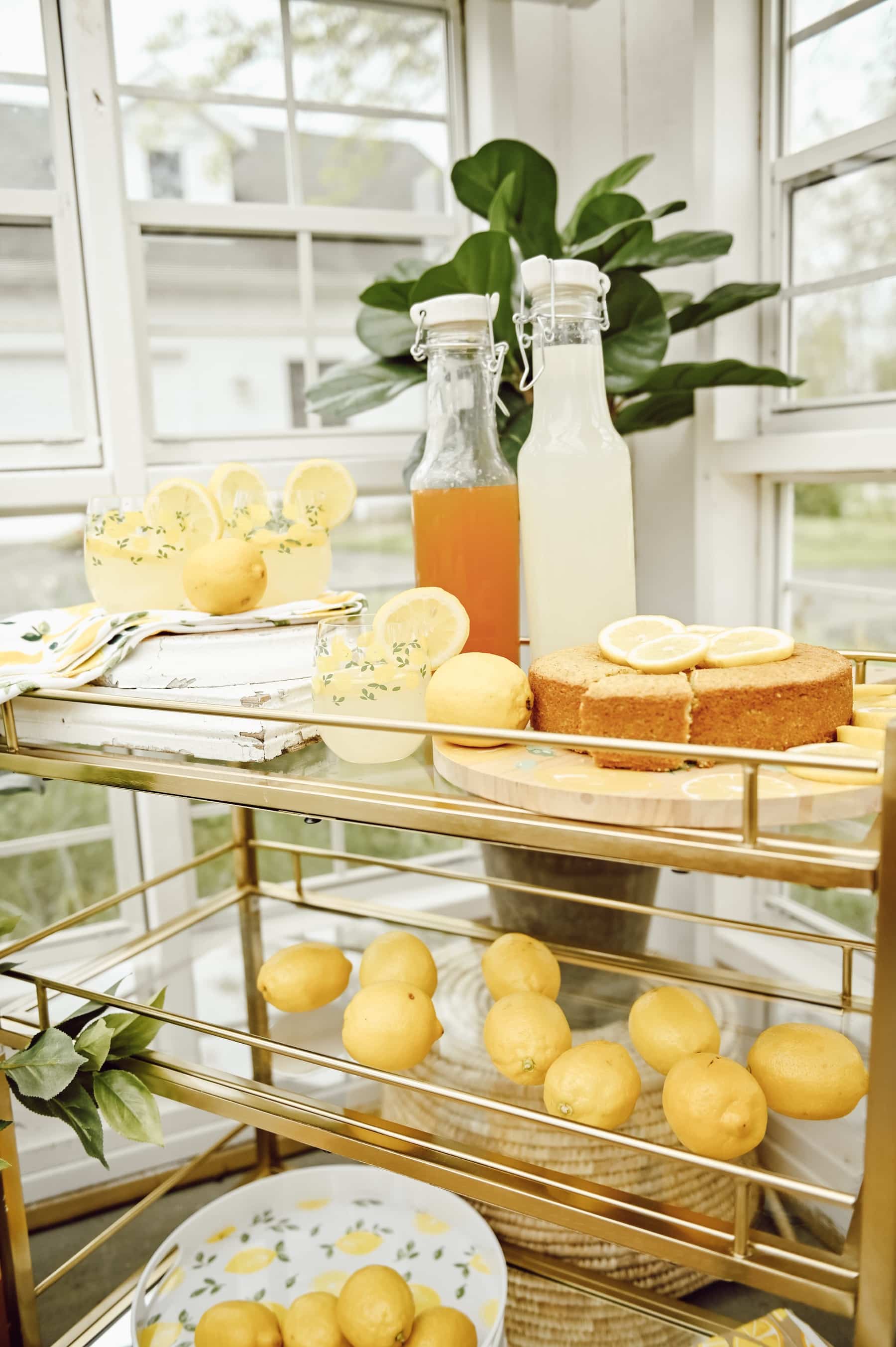 Homemade Lemon Drinks and pound cake on drink cart in greenhouse