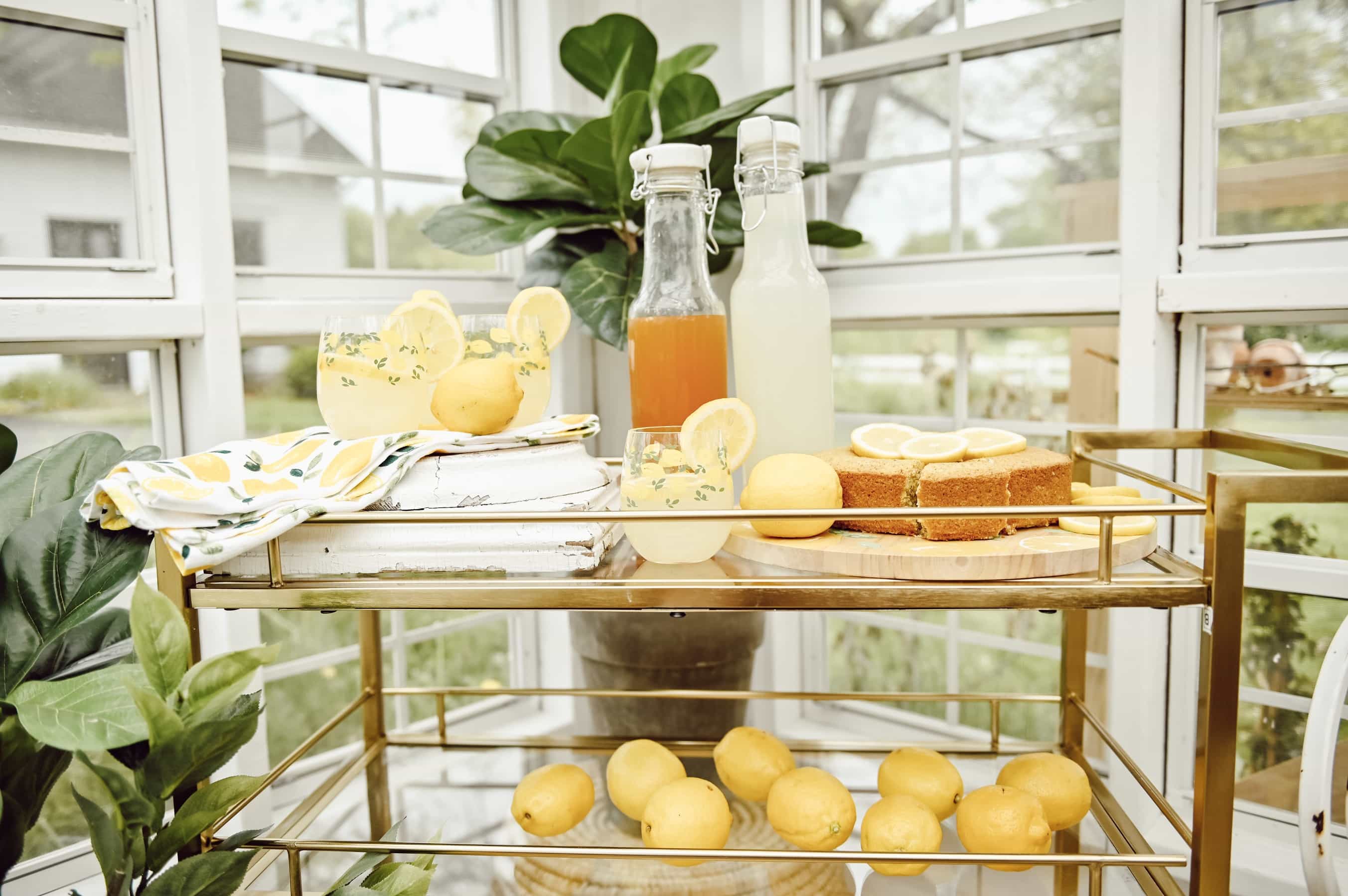 Drink cart with homemade Lemonade and lemons to kick off Lemon Party in the greenhouse