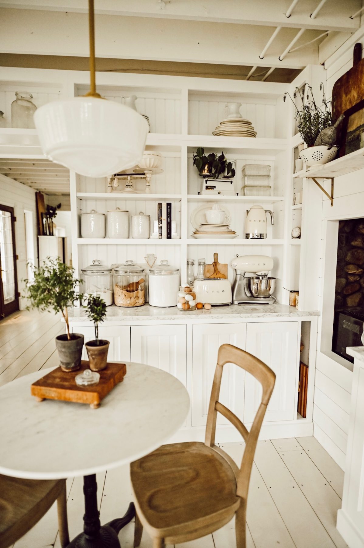 Small nook table from pottery barn with white quartz countertops