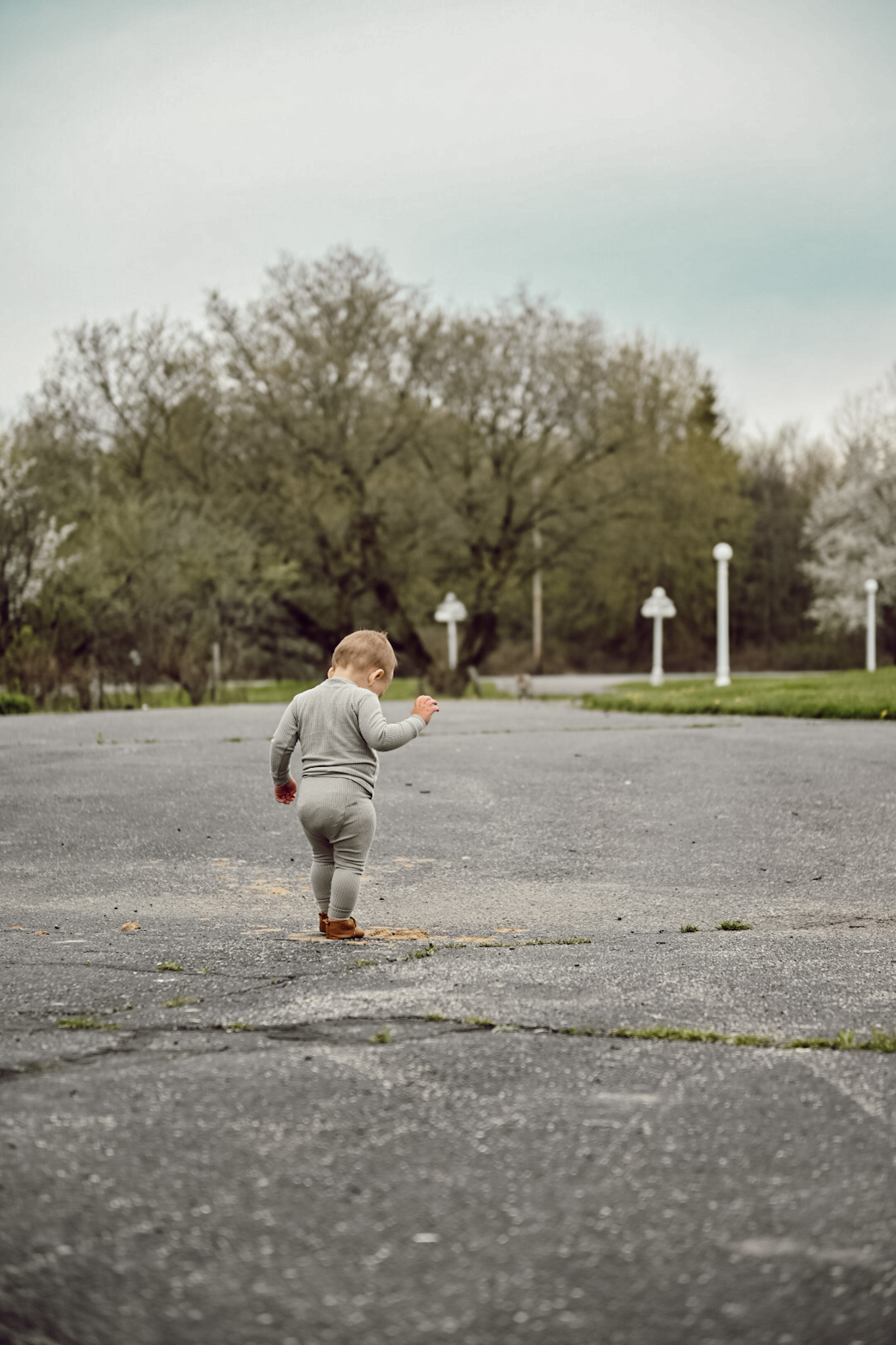 Wide Shot of Little boy walking
