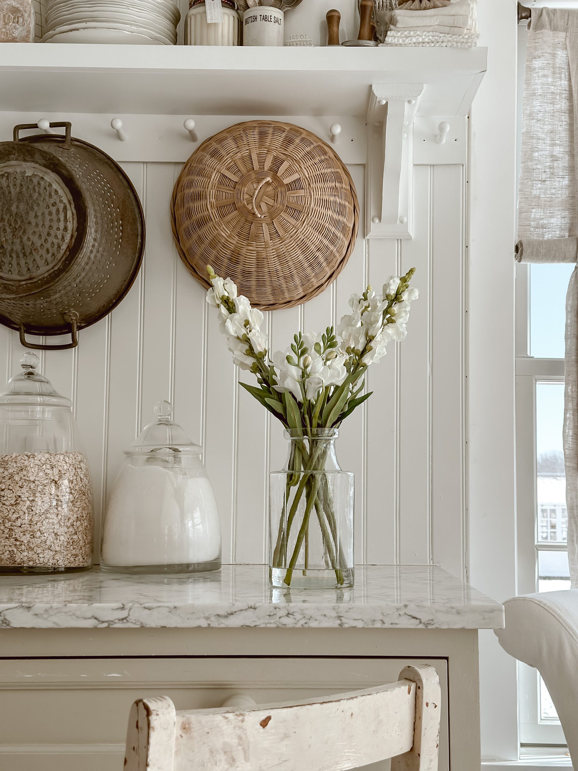 Peg rail food storage lids hanging on peg rail 