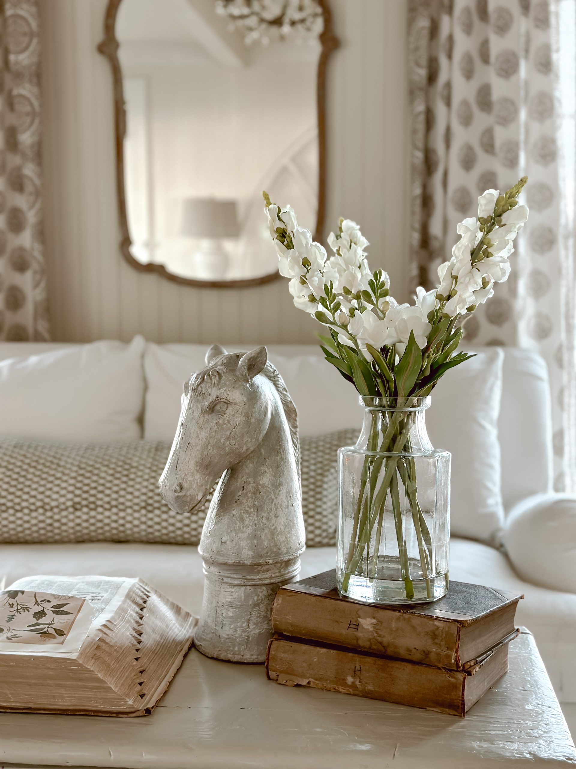 DIY floral with faux water acrylic holder and QVC Vintage Inspired Horse. 